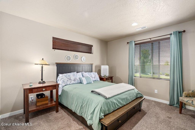 4615 N Connery Loop, Post Falls, ID 83854 - bedroom featuring a textured ceiling, carpet, and baseboards
