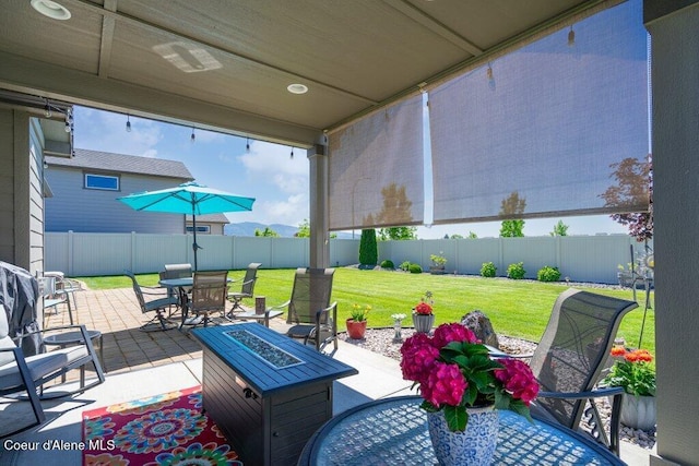 4615 N Connery Loop, Post Falls, ID 83854 - view of patio / terrace with outdoor dining area and an outdoor fire pit