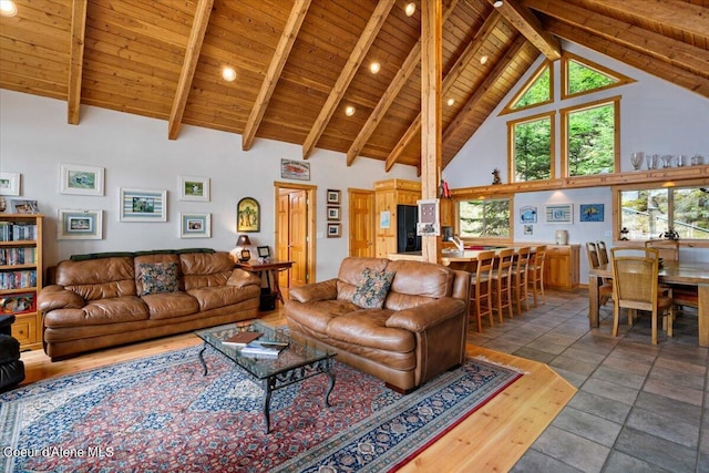 7373 E Hayden Haven Rd, Hayden, ID 83835 - living room featuring wood ceiling with exposed beams, high vaulted ceiling, and recessed lighting