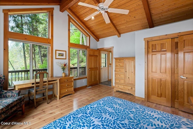 7373 E Hayden Haven Rd, Hayden, ID 83835 - bedroom featuring high vaulted ceiling, light wood-style floors, and wood ceiling with exposed beams