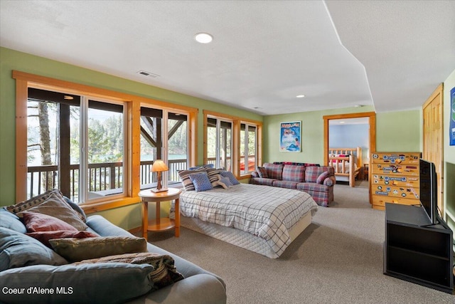 7373 E Hayden Haven Rd, Hayden, ID 83835 - living room with plenty of natural light, carpet flooring, and recessed lighting