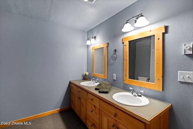 7373 E Hayden Haven Rd, Hayden, ID 83835 - full bath featuring double vanity and toilet