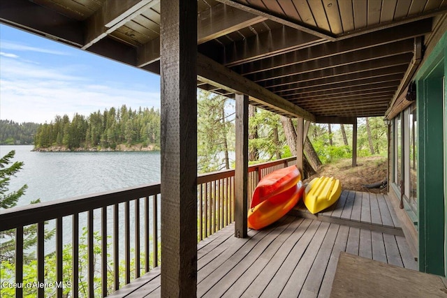 7373 E Hayden Haven Rd, Hayden, ID 83835 - wooden deck featuring a water view