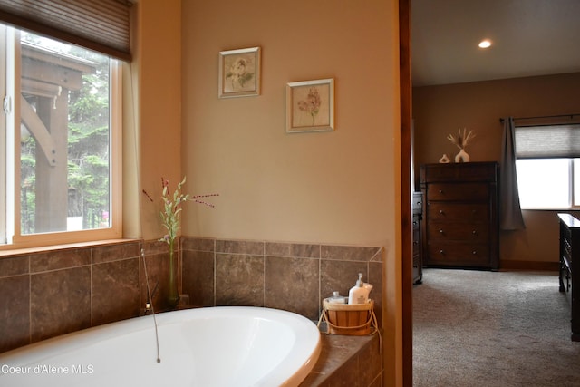 995 S Saddleback Dr, Coeur Dalene, ID 83814 - bathroom with a bath, healthy amount of natural light, and recessed lighting