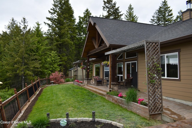 995 S Saddleback Dr, Coeur Dalene, ID 83814 - view of yard featuring a patio area