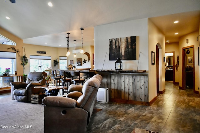 995 S Saddleback Dr, Coeur Dalene, ID 83814 - living room with recessed lighting, arched walkways, and baseboards
