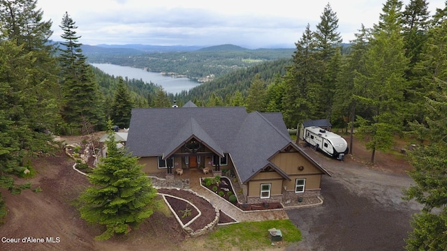 995 S Saddleback Dr, Coeur Dalene, ID 83814 - view from above of property with a heavily wooded area and a water and mountain view