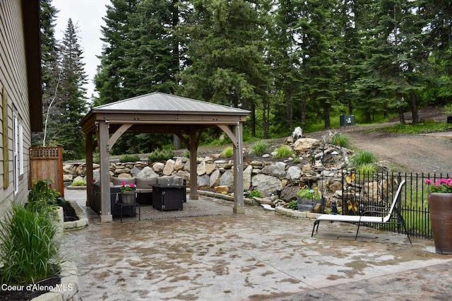 995 S Saddleback Dr, Coeur Dalene, ID 83814 - view of patio / terrace featuring a gazebo and outdoor lounge area