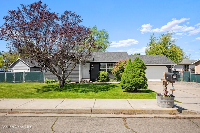 1125 N Shannon Ln, Post Falls, ID 83854 - view of front of house with concrete driveway and a garage