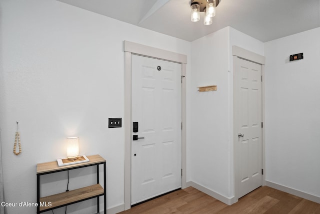 1125 N Shannon Ln, Post Falls, ID 83854 - foyer entrance featuring light wood-style floors and baseboards