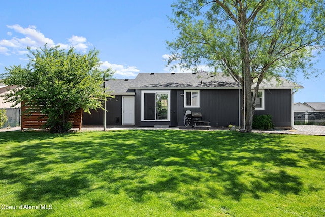 1125 N Shannon Ln, Post Falls, ID 83854 - back of house with a patio