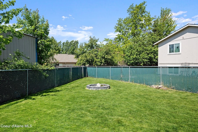1125 N Shannon Ln, Post Falls, ID 83854 - view of yard featuring an outdoor fire pit