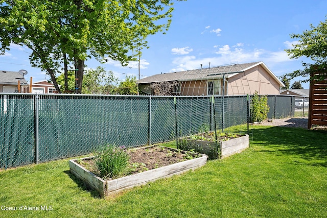 1125 N Shannon Ln, Post Falls, ID 83854 - view of yard featuring a vegetable garden