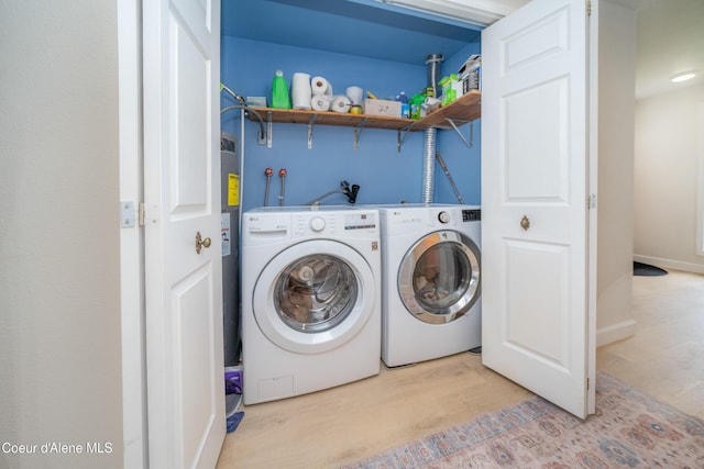 1707 E 2nd Ave, Post Falls, ID 83854 - laundry area with washer and clothes dryer and light wood-style floors