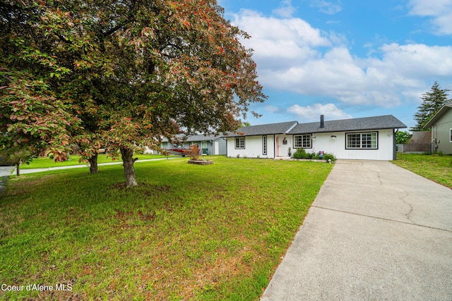 1707 E 2nd Ave, Post Falls, ID 83854 - ranch-style home featuring driveway and a front yard