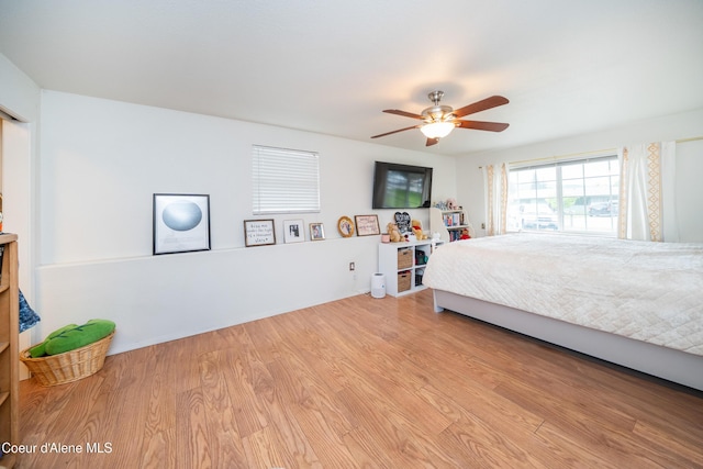 1707 E 2nd Ave, Post Falls, ID 83854 - bedroom featuring wood finished floors and a ceiling fan