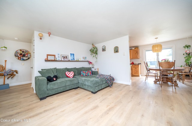 1707 E 2nd Ave, Post Falls, ID 83854 - living area featuring light wood finished floors and baseboards