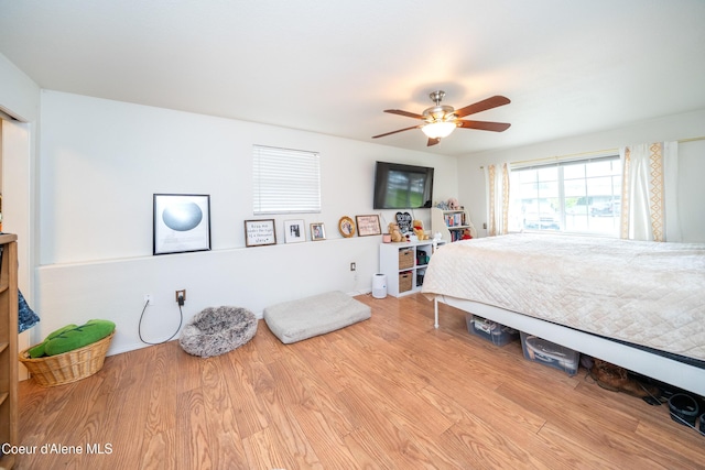 1707 E 2nd Ave, Post Falls, ID 83854 - bedroom with wood finished floors and a ceiling fan