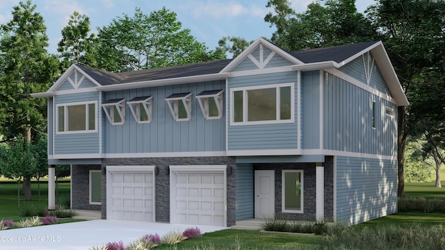 691 N Creative Way, Post Falls, ID 83854 - view of front facade with stone siding, an attached garage, board and batten siding, and concrete driveway