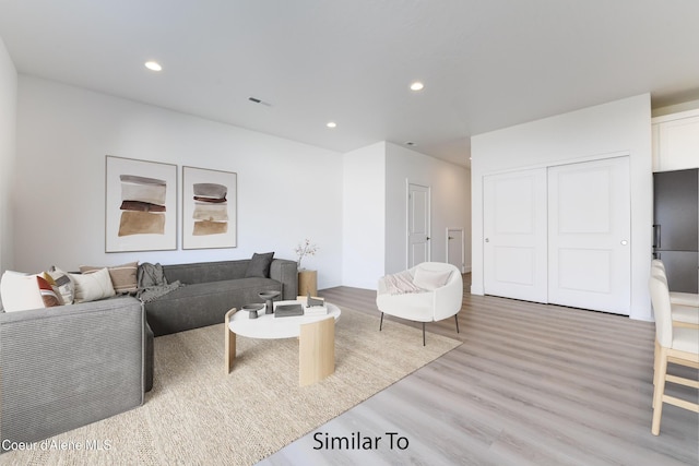 691 N Creative Way, Post Falls, ID 83854 - living area featuring light wood-type flooring and recessed lighting