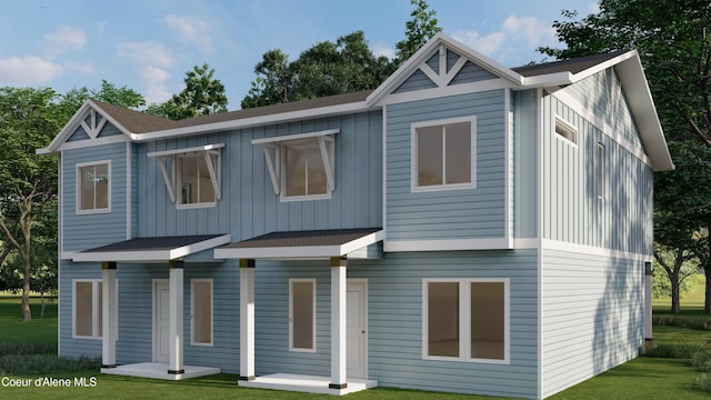 691 N Creative Way, Post Falls, ID 83854 - view of front of property featuring board and batten siding and a front lawn