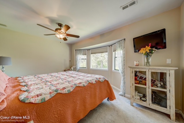 7485 E Revilo Point Rd, Hayden, ID 83835 - carpeted bedroom featuring ceiling fan and baseboards