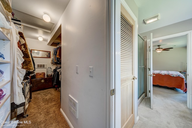 7485 E Revilo Point Rd, Hayden, ID 83835 - hall with light colored carpet