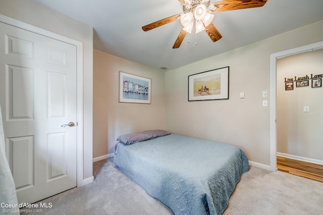 7485 E Revilo Point Rd, Hayden, ID 83835 - carpeted bedroom featuring baseboards and ceiling fan