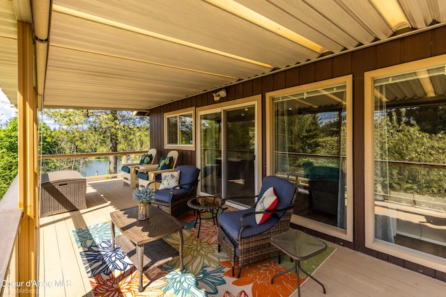 7485 E Revilo Point Rd, Hayden, ID 83835 - deck with a water view and an outdoor hangout area