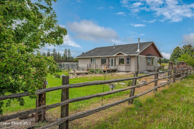222 E Remington Rd, Athol, ID 83801 - back of property featuring a deck and a shingled roof