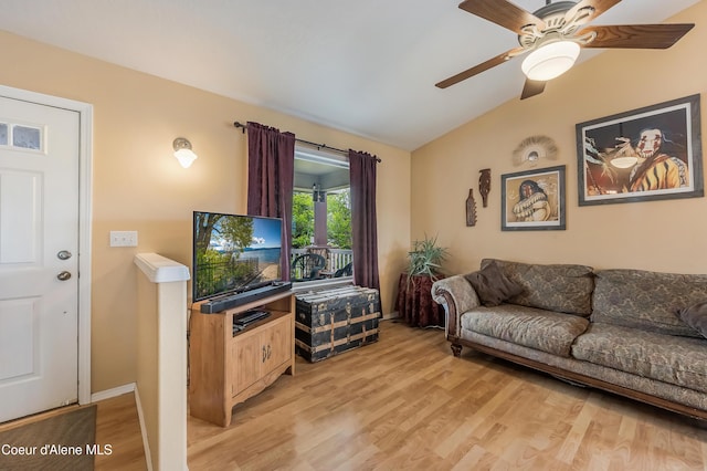 222 E Remington Rd, Athol, ID 83801 - living room featuring vaulted ceiling, light wood-style floors, and a ceiling fan