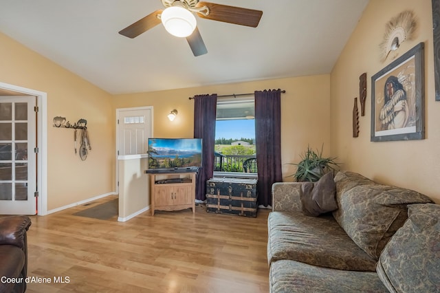 222 E Remington Rd, Athol, ID 83801 - living room with vaulted ceiling, wood finished floors, a ceiling fan, and baseboards