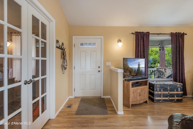 222 E Remington Rd, Athol, ID 83801 - foyer with light wood-style floors, french doors, and baseboards