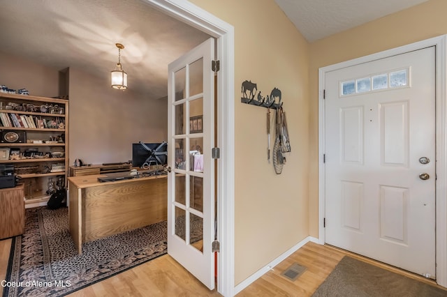 222 E Remington Rd, Athol, ID 83801 - entryway featuring wood finished floors and french doors