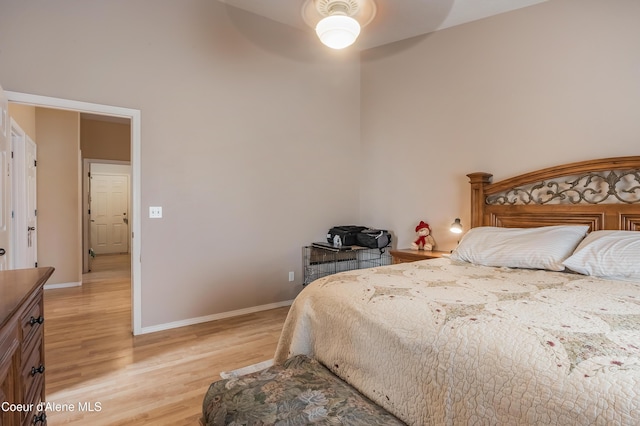 222 E Remington Rd, Athol, ID 83801 - bedroom with light wood-style flooring, baseboards, and ceiling fan