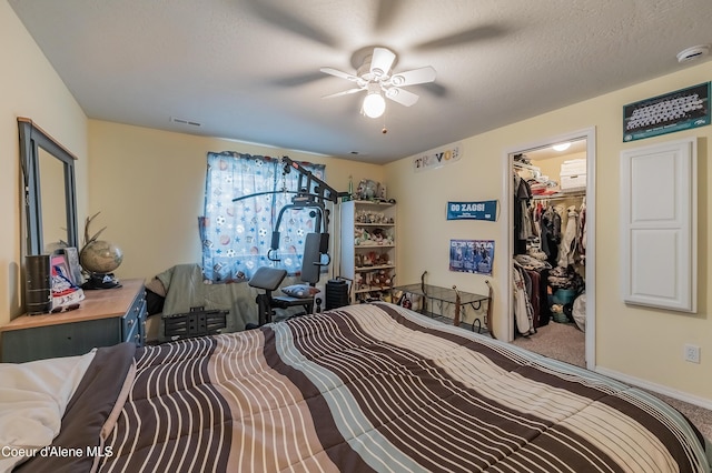 222 E Remington Rd, Athol, ID 83801 - bedroom with carpet floors, a ceiling fan, and a closet