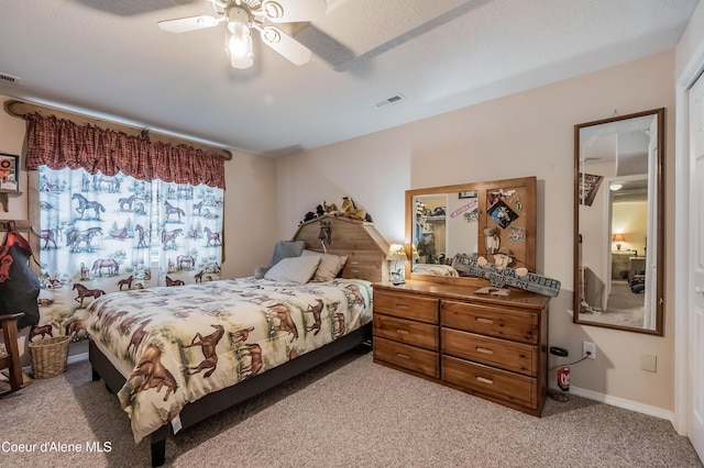 222 E Remington Rd, Athol, ID 83801 - bedroom with light colored carpet and a ceiling fan