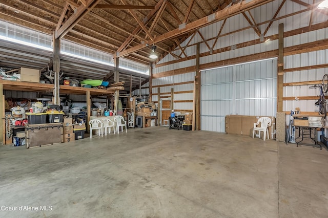 222 E Remington Rd, Athol, ID 83801 - garage featuring metal wall and a workshop area