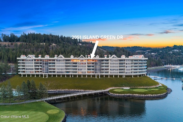 2051 S Island Green Dr, Coeur Dalene, ID 83814 - bird's eye view of a large body of water and a heavily wooded area