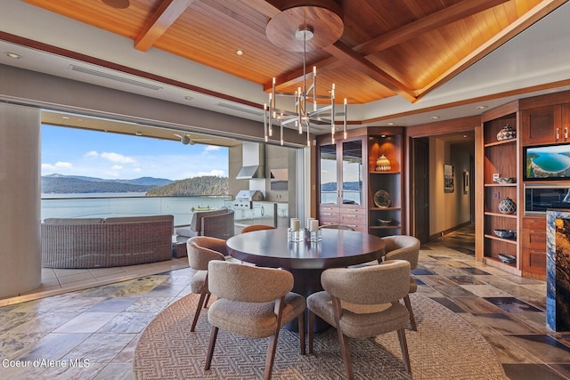 2051 S Island Green Dr, Coeur Dalene, ID 83814 - dining room with wood ceiling with exposed beams, a mountain view, a chandelier, stone tile flooring, and recessed lighting