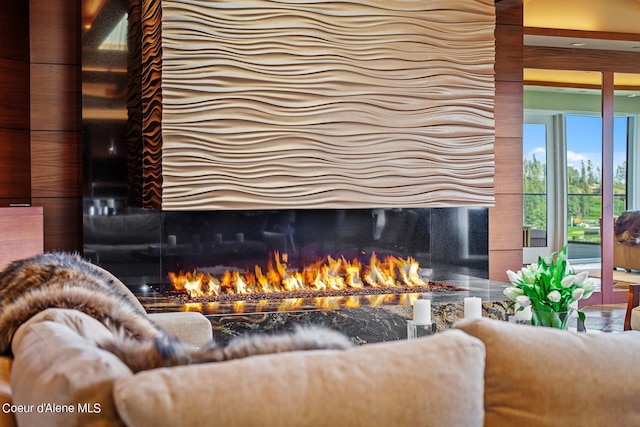 2051 S Island Green Dr, Coeur Dalene, ID 83814 - living area featuring a warm lit fireplace