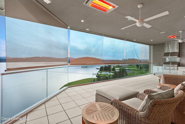 2051 S Island Green Dr, Coeur Dalene, ID 83814 - balcony with ceiling fan and a grill