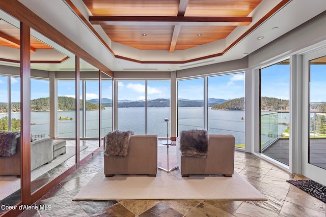 2051 S Island Green Dr, Coeur Dalene, ID 83814 - sunroom featuring healthy amount of natural light and a water and mountain view