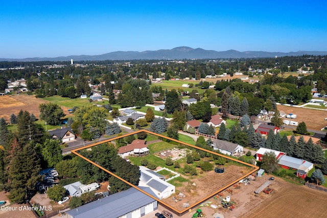 6264 N 15th St, Dalton Gardens, ID 83815 - aerial overview of property's location with property boundaries highlighted and a mountainous background