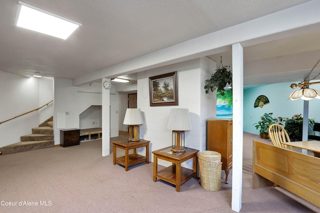 6264 N 15th St, Dalton Gardens, ID 83815 - living area with carpet floors, stairway, and a textured ceiling