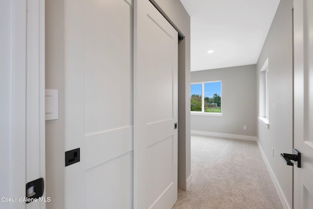 1670 Onyx Ct, Sandpoint, ID 83864 - hallway featuring light carpet and baseboards