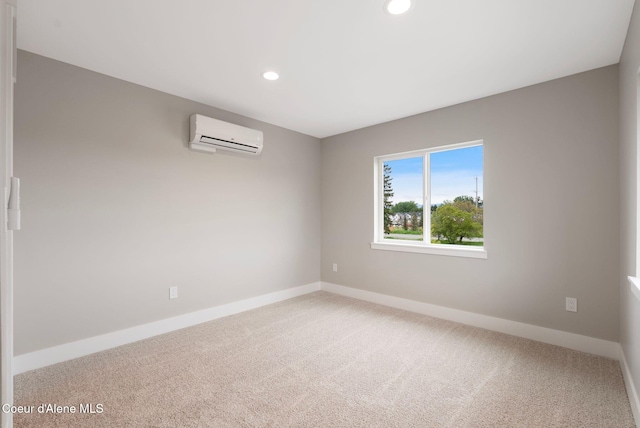 1670 Onyx Ct, Sandpoint, ID 83864 - carpeted spare room featuring a wall unit AC, baseboards, and recessed lighting