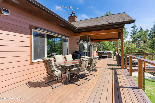 17378 N Freddi Rd, Rathdrum, ID 83858 - deck featuring a hot tub and outdoor dining space