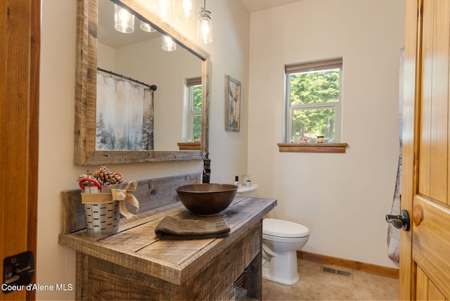 17378 N Freddi Rd, Rathdrum, ID 83858 - full bath featuring vanity, toilet, and baseboards