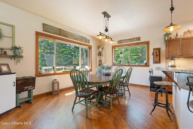 17378 N Freddi Rd, Rathdrum, ID 83858 - dining room featuring light wood-style flooring and baseboards